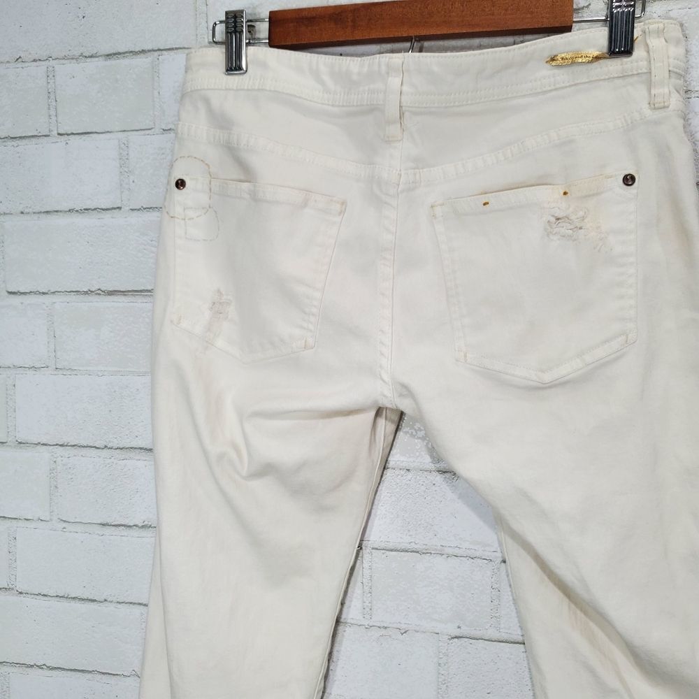 Women's Distressed White Patch Jeans - Picture 12 of 16